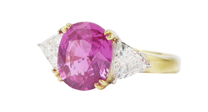 From Bernard Nacht & Company’s Under the Crown estate jewelry collection is this ring featuring a 4.04-carat cushion shape purplish pink sapphire with two trillion shape diamonds weighing 1.10 carats and set in 18-kart yellow gold ($25,000). From Bernard Nacht & Company’s Under the Crown estate jewelry collection is this ring featuring a 4.04-carat cushion shape purplish pink sapphire with two trillion shape diamonds weighing 1.10 carats and set in 18-kart yellow gold ($25,000).
