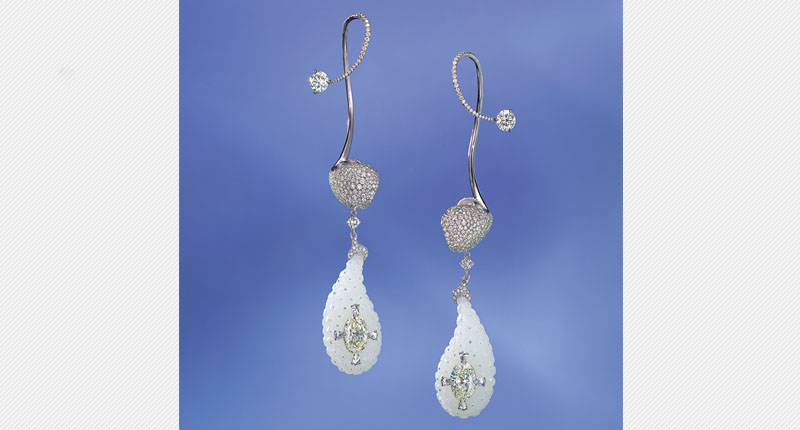 A pair of nephrite jade and diamond “Innocence” ear pendants that are expected to sell for between $100,000 and $150,000 A pair of nephrite jade and diamond “Innocence” ear pendants that are expected to sell for between $100,000 and $150,000