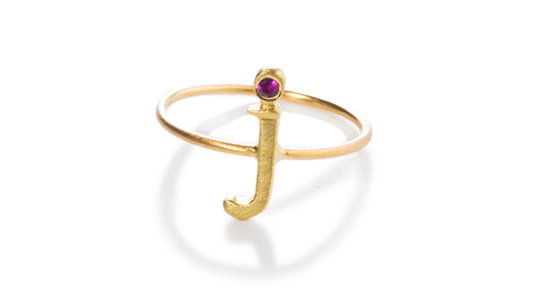 The “J” ring from the Love Letters line, made in 18-karat gold with a ruby ($395)