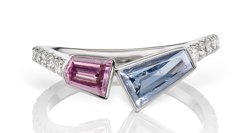 Scott West Diamonds’ platinum and duel-stone Deco diamond ring, featuring a fancy blue tapered baguette and a fancy intense purplish-pink trapezoid diamond and white round melee diamonds on the shank ($63,000). Luxury at JCK, LUX 1337. <a href="http://www.scottwestdiamonds.com" target="_blank">ScottWestDiamonds.com</a>