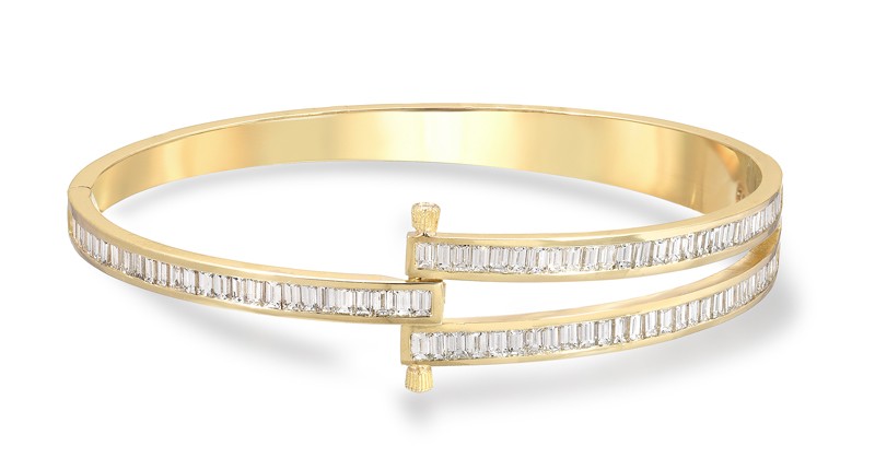 <p><a href="https://www.retrouvai.com/collections/magna/products/magna-bracelet-with-white-baguette-cut-diamonds" target="_blank" rel="noopener">Retrouvaí</a> 14-karat yellow gold “Magna Bracelet” with white baguette-cut diamonds ($14,520)</p>
<p> </p>