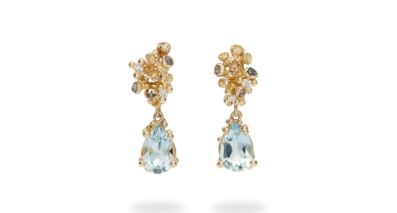 <p><a href="https://ruthtomlinson.com/products/aquamarine-drops-with-grey-diamonds-and-barnacles" target="_blank" rel="noopener">Ruth Tomlinson</a> aquamarine drop earrings with faceted white diamonds and rose cut grey diamonds set in 14-karat yellow gold ($2,400) </p> <p><a href="https://ruthtomlinson.com/products/aquamarine-drops-with-grey-diamonds-and-barnacles" target="_blank" rel="noopener">Ruth Tomlinson</a> aquamarine drop earrings with faceted white diamonds and rose cut grey diamonds set in 14-karat yellow gold ($2,400) </p>