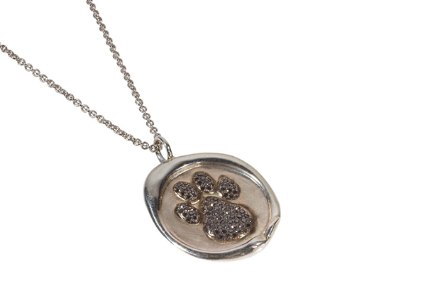 Catherine Angiel’s Dog Paw diamond necklace is made in sterling silver and set with 0.45 carats of black diamonds ($2,600). A percent of profits are donated to the <a href="http://www.humanesociety.org/" target="_blank"><span style="color: rgb(255, 0, 0);">Humane Society</span></a>. <a href="http://catherineangiel.com/" target="_blank"><span style="color: rgb(255, 0, 0);">catherineangiel.com</span></a> Catherine Angiel’s Dog Paw diamond necklace is made in sterling silver and set with 0.45 carats of black diamonds ($2,600). A percent of profits are donated to the <a href="http://www.humanesociety.org/" target="_blank"><span style="color: rgb(255, 0, 0);">Humane Society</span></a>. <a href="http://catherineangiel.com/" target="_blank"><span style="color: rgb(255, 0, 0);">catherineangiel.com</span></a>