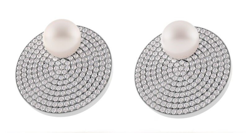 <a href="http://www.spinellikilcollin.com" target="_blank" rel="noopener noreferrer">Spinelli Kilcollin</a> Saturn earrings featuring South Sea pearls and pave-set white diamonds in 18-karat white gold ($15,000) <a href="http://www.spinellikilcollin.com" target="_blank" rel="noopener noreferrer">Spinelli Kilcollin</a> Saturn earrings featuring South Sea pearls and pave-set white diamonds in 18-karat white gold ($15,000)