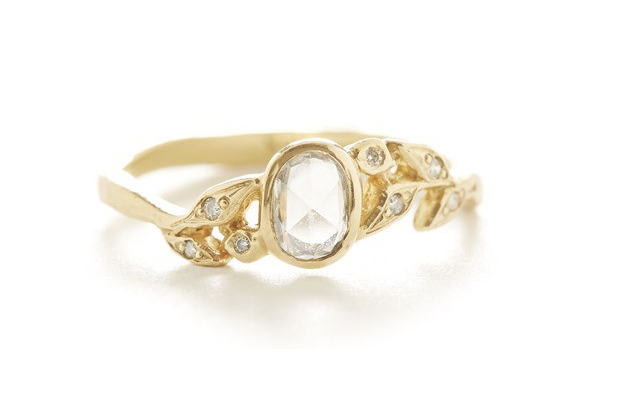 Dawes Designs’ “Vine” solitaire ring in 18-karat sculpted yellow gold with an oval rose-cut diamond accented with round full-cut diamonds, flush-set in a leaf motif band ($3,125) <a href="http://www.dawes-design.com/" target="_blank"><span style="color: rgb(255, 0, 0);">Dawes-Design.com</span></a>
