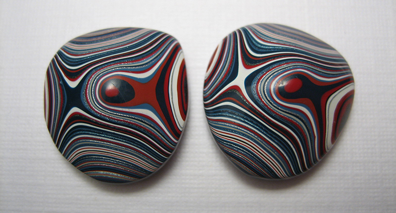 Two pieces of fordite (Photo credit: Fordite.com)