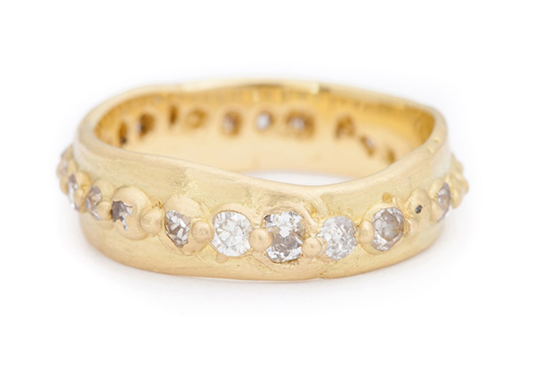 Polly Wales’ “Wide Pinched Gold” eternity ring is made in 18-karat gold with a brushed satin finish and 1.50 carats of old mine-cut diamonds cast in place ($6,600). <a href="http://www.pollywales.com/" target="_blank"><span style="color: rgb(255, 0, 0);">PollyWales.com</span></a>