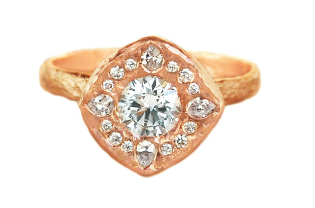 Anouk Jewelry’s “Ornate Halo Cushion” ring is made in 14-karat rose gold with a .50-carat diamond and a halo of 12 round and four pear-shaped diamonds (from $5,200). <a href="http://anoukjewelry.com/" target="_blank"><span style="color: rgb(255, 0, 0);">AnoukJewelry.com</span></a>