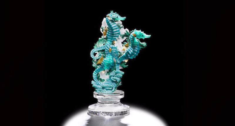 The gem silica chrysocolla used in this piece from Gerd Dreher has “extraordinary translucency and evenness in color,” Bonhams said. It also features malachite and milky quartz as well as 18-karat yellow gold and cabochon sapphires, and could sell for between $25,000 and $30,000. The gem silica chrysocolla used in this piece from Gerd Dreher has “extraordinary translucency and evenness in color,” Bonhams said. It also features malachite and milky quartz as well as 18-karat yellow gold and cabochon sapphires, and could sell for between $25,000 and $30,000.