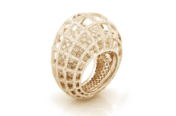 The 18-karat yellow gold “Matrix” double ring features white diamonds ($36,800) and is also available in 18-karat white gold. The 18-karat yellow gold “Matrix” double ring features white diamonds ($36,800) and is also available in 18-karat white gold.