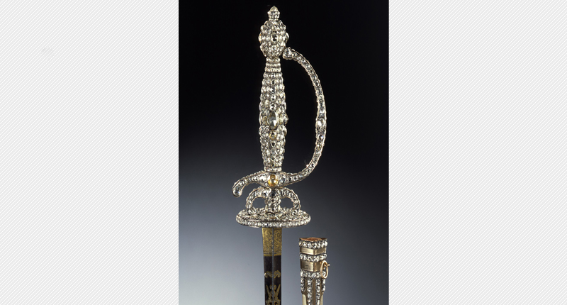 A jewel-encrusted sword and scabbard (Photo credit: © Grünes Gewölbe, Staatliche Kunstsammlungen Dresden; Photo: Jürgen Karpinski) A jewel-encrusted sword and scabbard (Photo credit: © Grünes Gewölbe, Staatliche Kunstsammlungen Dresden; Photo: Jürgen Karpinski)