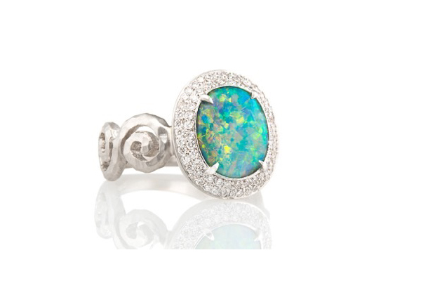 Pamela Froman’s one-of-a-kind “Ellie” ring features a blue-green Lightning Ridge black opal set in 18-karat white gold and framed by a double halo of diamond pavé ($15,400). <a href="http://www.pamelafroman.com/" target="_blank"><span style="color: rgb(255, 0, 0);">PamelaFroman.com</span></a>