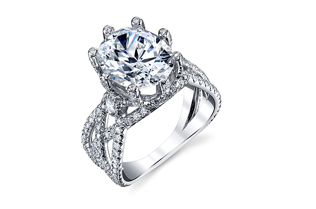 Erica Courtney’s “Crossover” ring in platinum with diamond center and surrounding diamonds ($17,200) <a href="http://www.ericacourtney.com/" target="_blank"><span style="color: rgb(255, 0, 0);">EricaCourtney.com</span></a>