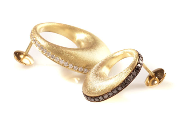 The 18-karat yellow gold “Aya” stripe earrings feature white diamonds ($5,260) or black diamonds ($3,850). The 18-karat yellow gold “Aya” stripe earrings feature white diamonds ($5,260) or black diamonds ($3,850).