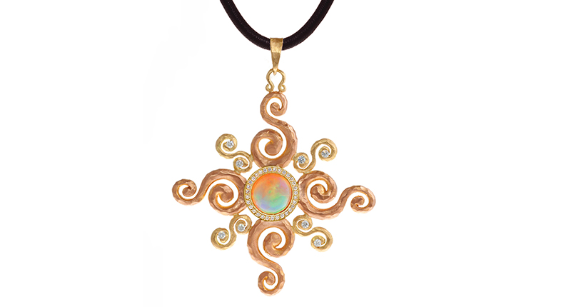 Pamela Froman’s “Arabesque Sunburst” pendant features 18-karat yellow and pink “crushed” gold scrolls with a 2.54-carat faceted Ethiopian opal framed by diamond pavé ($9,900). <a href="http://www.pamelafroman.com/" target="_blank">PamelaFroman.com</a>