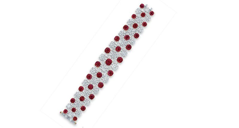 This signed Faidee bracelet features three lines of cushion-shaped Burmese rubies, weighing approximately 4.22 to 1.02 carats, alternating with cushion-shaped diamonds and accented by pear-shaped diamonds. It was the second highest-grossing lot in the Magnificent Jewels sale, selling for $3.5 million to a private buyer. 