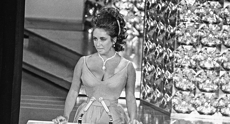 “The Cartiers” looks at the jewelry house’s rise to popularity and its many celebrity and royal clients. Here, actress Elizabeth Taylor is wearing the 69.42-carat pear-shaped Cartier (or Taylor-Burton) Diamond while presenting at the 1970 Academy Awards. (Photo credit: Getty Images)