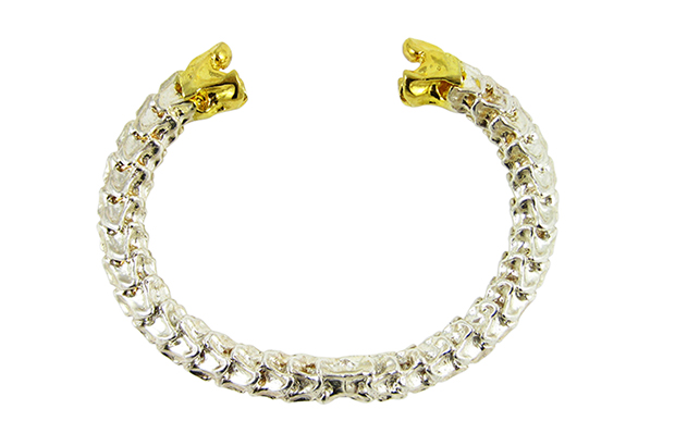 This sterling silver “Vertebrae” cuff features 18-karat yellow gold accents, and the accents also are available in 18-karat white or rose gold ($4,250).   This sterling silver “Vertebrae” cuff features 18-karat yellow gold accents, and the accents also are available in 18-karat white or rose gold ($4,250).