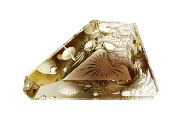 Dalan Hargrave of Sunstone Butte Mining’s 63.63-carat “Celestial City” sunstone carving won first place in the Innovative Faceting category. Dalan Hargrave of Sunstone Butte Mining’s 63.63-carat “Celestial City” sunstone carving won first place in the Innovative Faceting category.