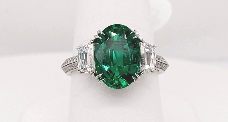 <strong>Bridal Wear.</strong> Niveet Nagpal of Omi Prive’s platinum ring featuring a 3.38-carat oval emerald accented with diamond epaulets weighing 1.00 total carats <strong>Bridal Wear.</strong> Niveet Nagpal of Omi Prive’s platinum ring featuring a 3.38-carat oval emerald accented with diamond epaulets weighing 1.00 total carats