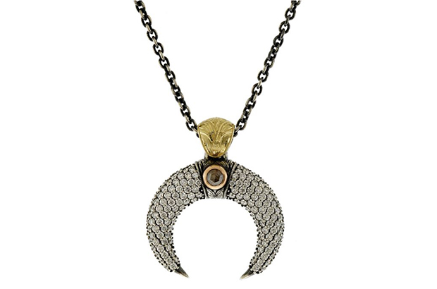 William Travis Kukovich of William Travis Jewelry created this oxidized silver and mixed gold pendant featuring a brown diamond accented with rose-cut diamonds, which won the Best Use of Silver and Color award. William Travis Kukovich of William Travis Jewelry created this oxidized silver and mixed gold pendant featuring a brown diamond accented with rose-cut diamonds, which won the Best Use of Silver and Color award.