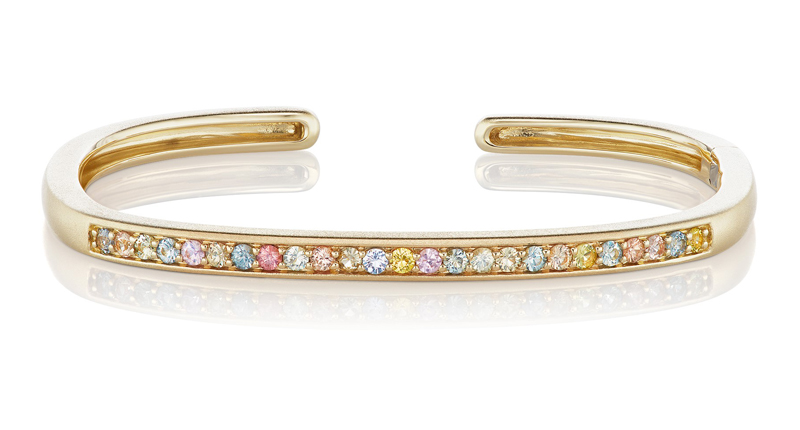 Jane Taylor’s hinged rectangular cuff bracelet in 14-karat yellow gold with multicolored sapphires ($3,740)
