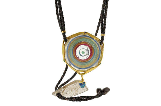The Fashion Forward award was given to this 24-karat yellow gold “Wheel of Light” pendant featuring quartz, paraiba tourmaline, hauyn, ruby, spessartite garnet, golden rutilated quartz and fire agate beads from Brian Cook of Nature’s Geometry. The Fashion Forward award was given to this 24-karat yellow gold “Wheel of Light” pendant featuring quartz, paraiba tourmaline, hauyn, ruby, spessartite garnet, golden rutilated quartz and fire agate beads from Brian Cook of Nature’s Geometry.