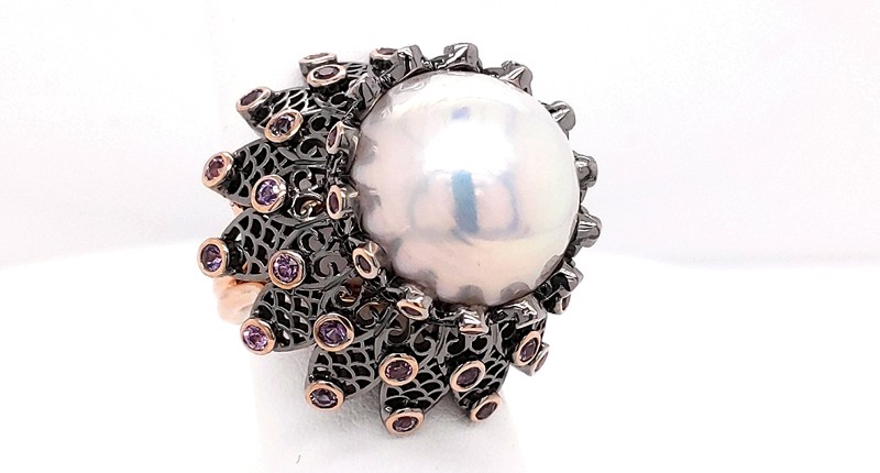 <strong>Best Use of Pearls.</strong> Brenda Smith of Brenda Smith Jewelry’s 18-karat rose gold “Black Lace” ring featuring a 16.5 mm cultured pearl accented with pink and lavender sapphires (2.86 total carats) and diamonds (0.06 total carats) <strong>Best Use of Pearls.</strong> Brenda Smith of Brenda Smith Jewelry’s 18-karat rose gold “Black Lace” ring featuring a 16.5 mm cultured pearl accented with pink and lavender sapphires (2.86 total carats) and diamonds (0.06 total carats)