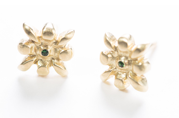 Inspired by lilies and made in Judi Powers’ signature petite minimalist style, these 18-karat green gold studs have a matte finish and flush-set 1 mm chrome tourmalines ($825). <a href="http://www.judipowersjewelry.com/" target="_blank"><span style="color: rgb(255, 0, 0);">JudiPowersJewelry.com</span></a>
