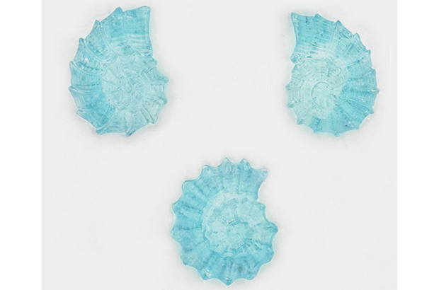 This suite of Paraiba tourmalines weighing 58.07 total carats, carved into nautilus shell shapes, won both Best of Show as well as the first place in the Carving category. This suite of Paraiba tourmalines weighing 58.07 total carats, carved into nautilus shell shapes, won both Best of Show as well as the first place in the Carving category.