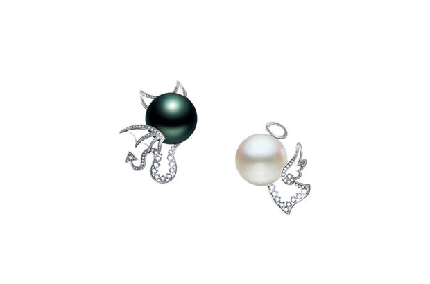 These “Yes or No” earrings by Wei-Na Tu of Taipei City, Taiwan were honored with the Luster Award, given to the most marketable design for retail.  These “Yes or No” earrings by Wei-Na Tu of Taipei City, Taiwan were honored with the Luster Award, given to the most marketable design for retail.
