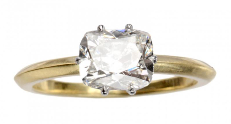 Just as Prince Harry proposed to American actress Meghan Markle with a ring utilizing two of his mother’s diamonds, this ring from Brooklyn-based brand Erie Basin, also in yellow gold, updates an older diamond in a new setting. The 1.33-carat old mine cut cushion diamond was cut in approximately 1850 and repurposed with a knife-edge shank in 2017. It retails for $11,250. <br /><a href="http://eriebasin.com/" target="_blank" rel="noopener noreferrer">ErieBasin.com</a>