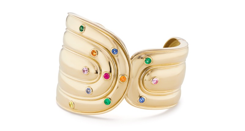 <p>“Marianne Cuff” in 18-karat yellow gold with multicolor sapphires and emeralds ($28,000)</p>