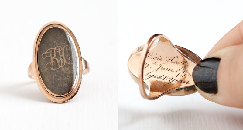 Mae Jean Vintage is currently selling this “breath-taking and rare” Georgian mourning ring from 1793. The 8-karat rose gold ring features human hair enclosed behind glass, likely that of the child whose identity is engraved in the back of the ring: Kate Hart, 19th June 1793, Aged 11 years. The date would presumably refer to the date she died.