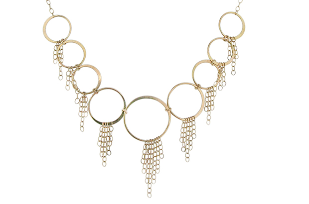 Melissa Joy Manning’s 14-karat yellow gold adjustable multi-tassel necklace gives an op-art feel to fringe ($825). <br />
<a target="_blank" href="https://melissajoymanning.com/"><span style="color: #f5fffa;">melissajoymanning.com</span></a>