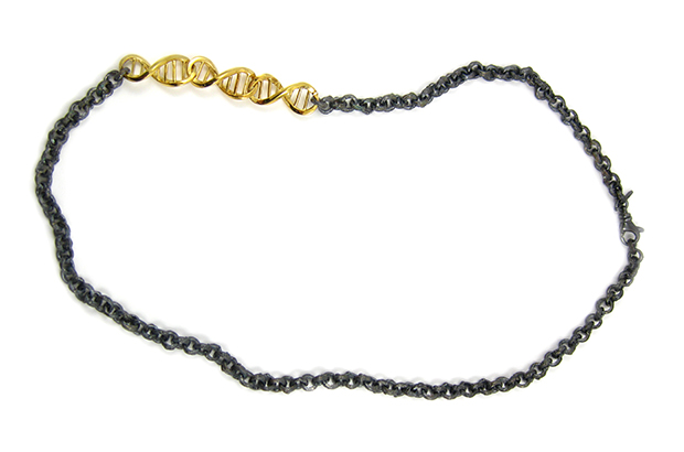 This black oxidized sterling silver “Chains of Love” necklace features 18-karat yellow gold “DNA” links ($10,525).  This black oxidized sterling silver “Chains of Love” necklace features 18-karat yellow gold “DNA” links ($10,525).