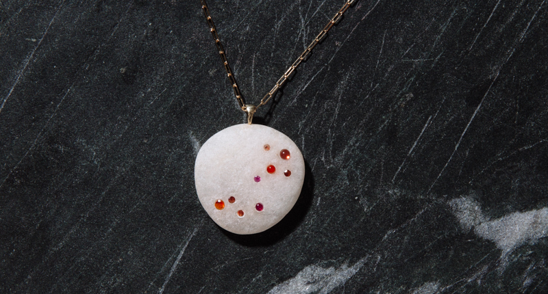 Venyx for CVC Stones’ necklace with colored gemstones arranged in the Scorpio constellation Venyx for CVC Stones’ necklace with colored gemstones arranged in the Scorpio constellation