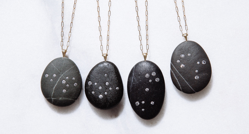 Various zodiac signs in CVC Stones’ traditional black-pebble-with-white-diamond style Various zodiac signs in CVC Stones’ traditional black-pebble-with-white-diamond style