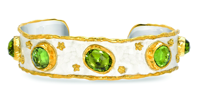 Victor Velyan’s 24-karat yellow gold and antique patina-plated silver cuff featuring 12.28 carats of peridot ($8,360)