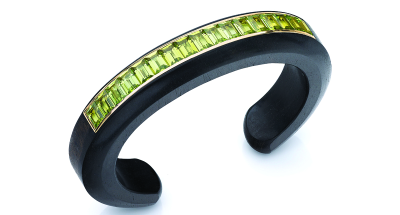 Maniazamani’s one-of-a-kind cuff made of ebony and peridot set in 18-karat yellow gold (price available upon request)