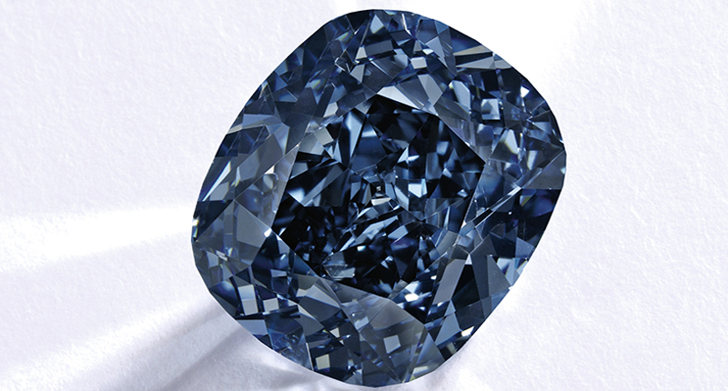 The “Blue Moon,” a 12.03-carat fancy vivid blue diamond, sold for $48.5 million. The “Blue Moon,” a 12.03-carat fancy vivid blue diamond, sold for $48.5 million.