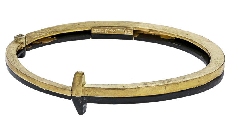 Pat Flynn Alchemy Nail Bracelet in iron and 22-karat yellow gold ($5,200, <a href="https://www.twistonline.com/designers-pat-flynn-bracelets/alchemy-nail-bracelet/_/searchString/pat%20flynn" target="_blank" rel="noopener">available at Twist</a>)