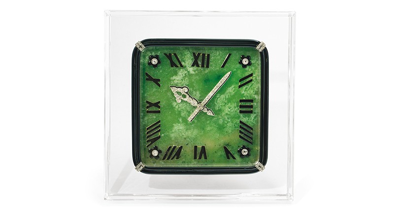 A 1928 Art Deco Cartier desk clock made with rock crystal, nephrite jade, rose-cut diamonds and black enamel (estimated to sell for between $83,000 and $120,000)
