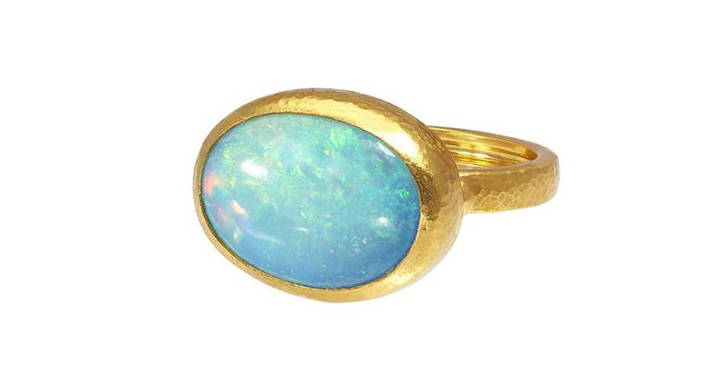 Gurhan one-of-a-kind "Amulet Hue" ring in 24-karat gold featuring a horizontal-set 6.62-carat oval cabochon opal ($7,500) <br /><a href="https://www.gurhan.com" target="_blank" rel="noopener noreferrer">www.gurhan.com</a>