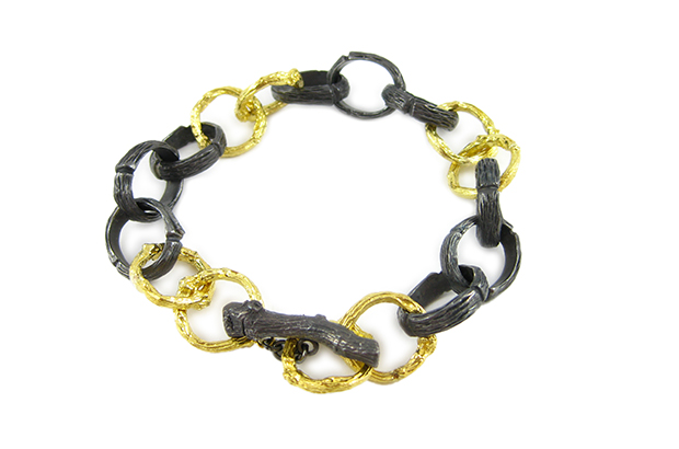 The “Twig O” chain bracelet features sterling silver and 18-karat yellow gold links, which also are available in 18-karat white or rose gold ($11,950).  The “Twig O” chain bracelet features sterling silver and 18-karat yellow gold links, which also are available in 18-karat white or rose gold ($11,950).