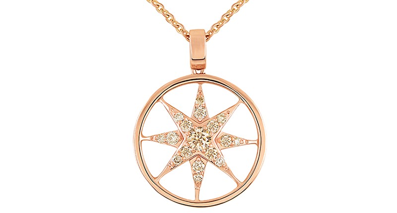 The "Inner Compass" pendant in 14-karat rose gold accented with light brown diamonds ($890)
