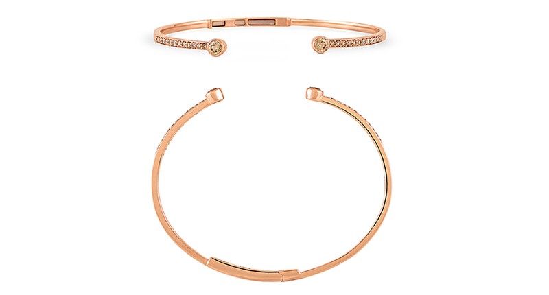 The "Zora" cuff bracelet in 14-karat rose gold set with light brown diamonds and topped with a bezel-set light brown diamond on each end ($1,990)