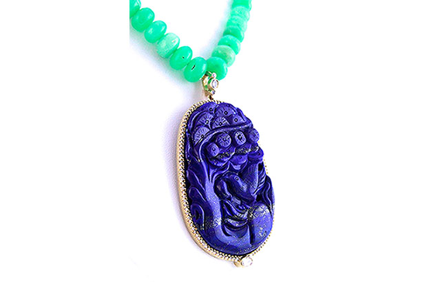 This 18-karat gold carved lapis pendant features diamond pavé and chrysoprase ($17,000). This 18-karat gold carved lapis pendant features diamond pavé and chrysoprase ($17,000).