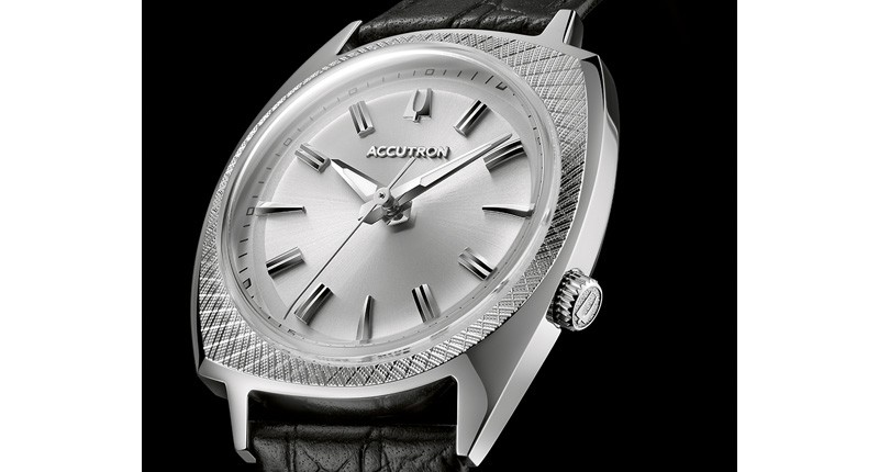 This watch is based on the “565” from 1966 and adds cross-hatching details to the asymmetrical case the brand was known for. The 34 mm watch with silver-tone stainless steel case and croco-embosssed leather strap retails for $1,390. This watch is based on the “565” from 1966 and adds cross-hatching details to the asymmetrical case the brand was known for. The 34 mm watch with silver-tone stainless steel case and croco-embosssed leather strap retails for $1,390.