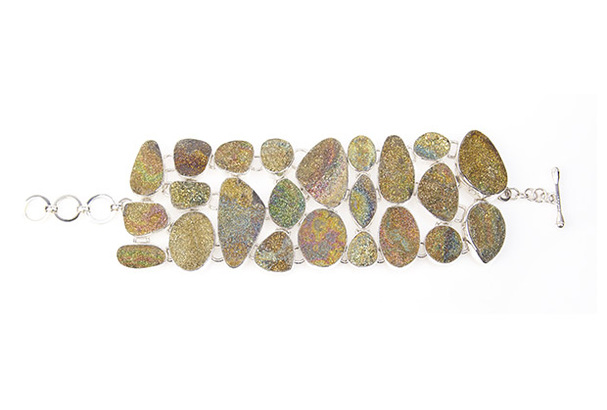 <p class="MsoNormal">This bracelet features rainbow pyrite and is made in
        sterling silver ($1,800).<o:p></o:p></p> <p class="MsoNormal">This bracelet features rainbow pyrite and is made in
        sterling silver ($1,800).<o:p></o:p></p>